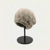 Korean version of fashion pearl headgear ear protection knitted heap hat winter handmade thickened warm mother wool hat women
