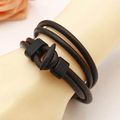 Bracciale rigido con ancoraggio punk multistrato in ecopelle da donna e uomo