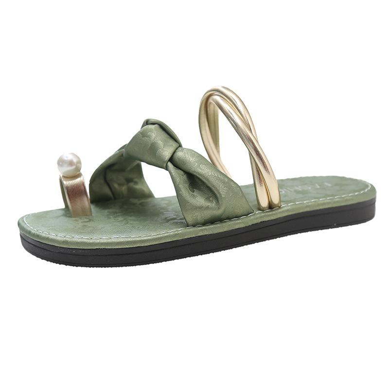Französische Nischen-High-End-Slipper mit flachem Boden für Damen-Oberbekleidung 2025 Sommer neue Mode lässig Zehen bedeckende Strandsandalen