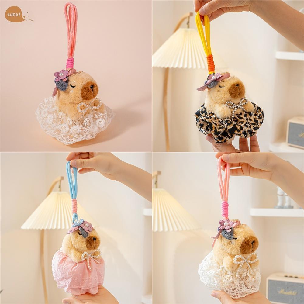 Søt blomsterhodeplagg sløyfe capybara plysjdukke anheng til gave og dekor