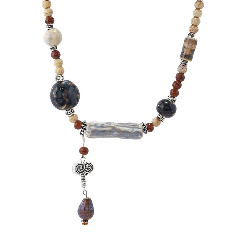 Neue chinesische Art Keramik Schlüsselbeinkette Damen einfach Nische High-End-Gefühl Sommer Retro literarisch und vielseitig Halsketten-Accessoires