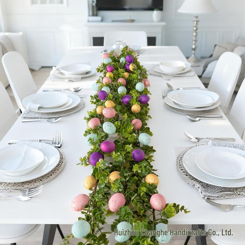 Oster-Rattan-Eukalyptusblätter mit bunten Eierranken für die Innendekoration