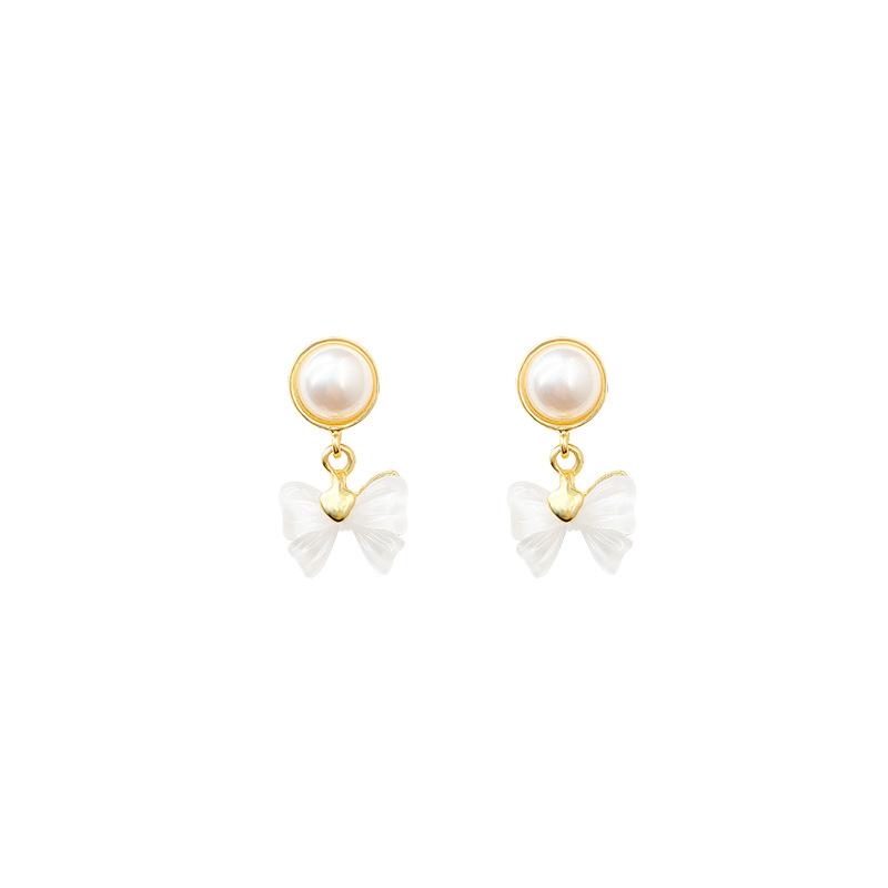 French retro pearl bow earrings women's versatile niche temperament super fairy stud earrings silver needle earrings