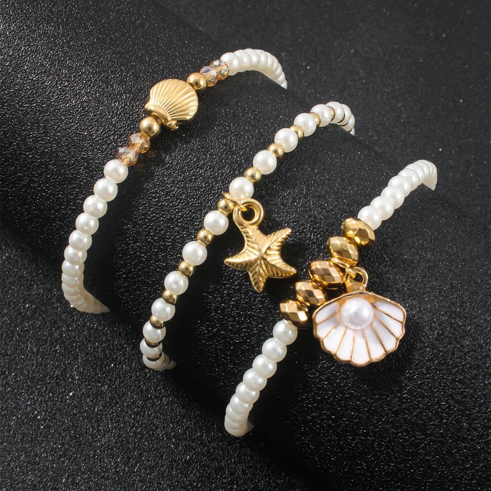 5 Stück Bohemian Meeresmotiv Perlenbesticktes mehrschichtiges Armband-Set für Damen Seestern Schildkrötenpanzer Anhänger Sommer Strandurlaub Schmucksets