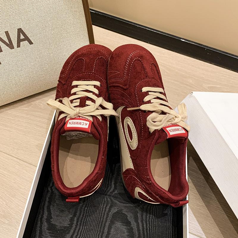 Fashion color matching versatile women's sports board shoes autumn and winter simple niche design sense thick sole heightening bread shoes tide