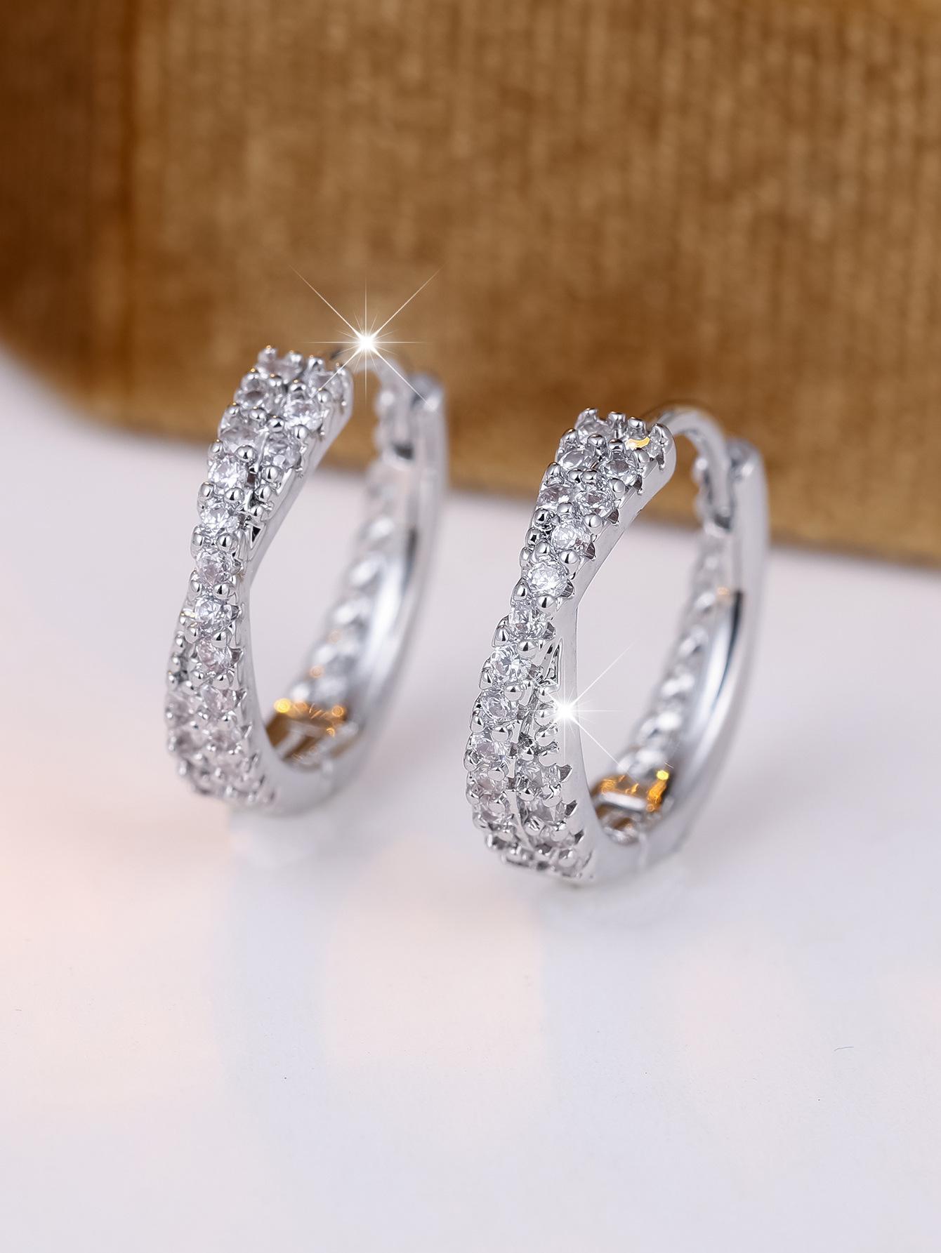 

Twist full zircon earrings, shining hot