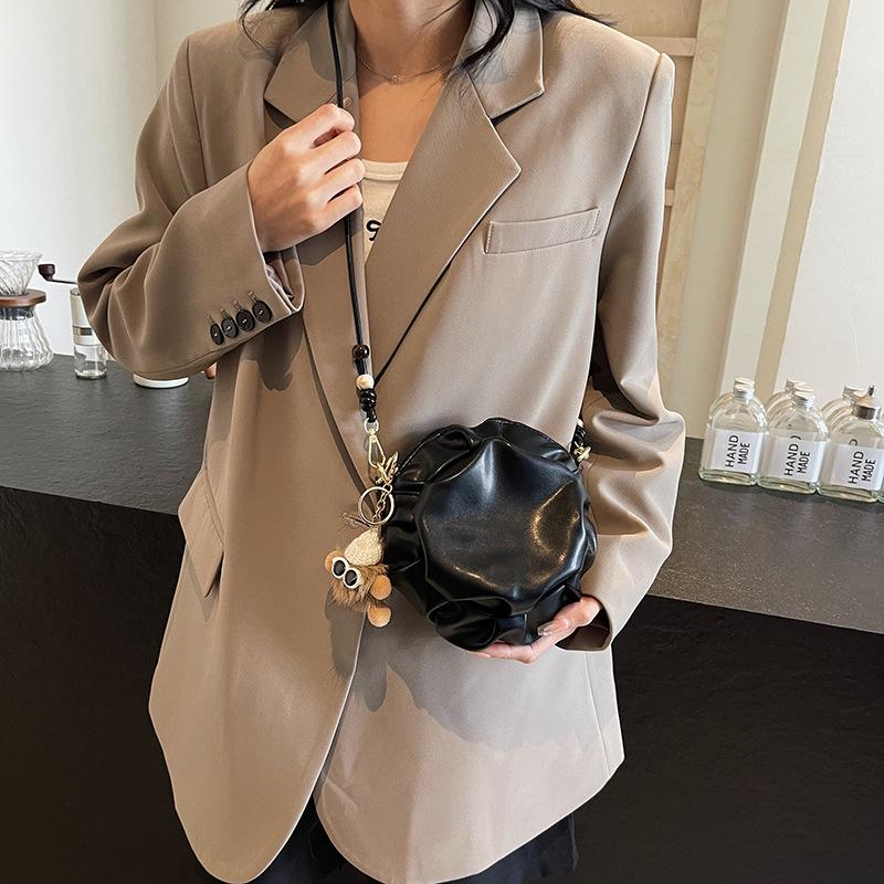 Niche cute girl pleated small round bag design sense small bag women 2025 new trendy shoulder messenger bag