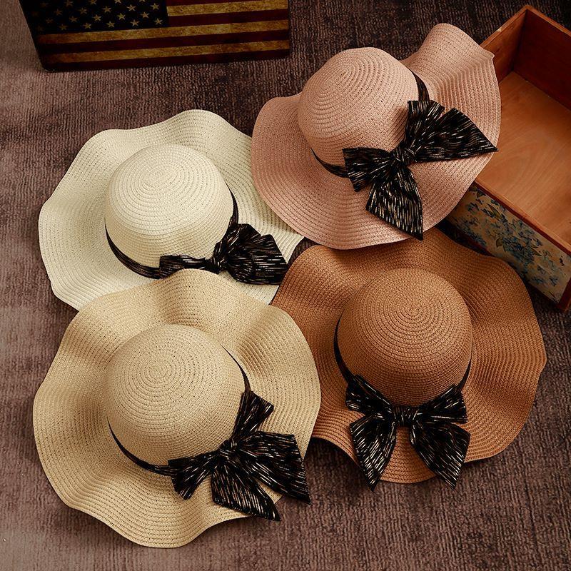 Sweet bow sunscreen beach hat women's spring and summer straw woven wave hat outdoor outing big eaves bucket hat