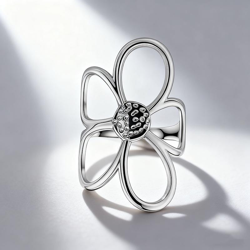 

Adjustable Stainless Steel Women s Flower Hollow Ring