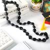 Collana di noci di kukui - Laurea Classe 2023 - Ghirlanda di noci con perline nere e fiocco - Regalo di laurea - Accessorio per feste