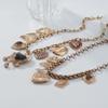 2024 Multi-Layer Metal Retro Love Pendant Necklace - Bohemian Style for Women