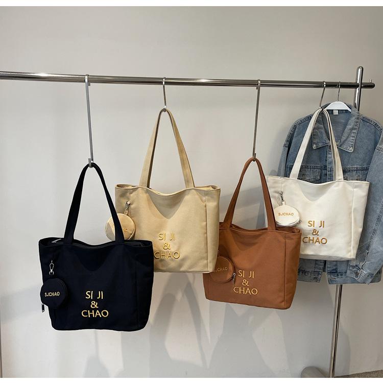 Women's Large-capacity Canvas Bag, Simple Letters, Versatile Commuting Artifact.