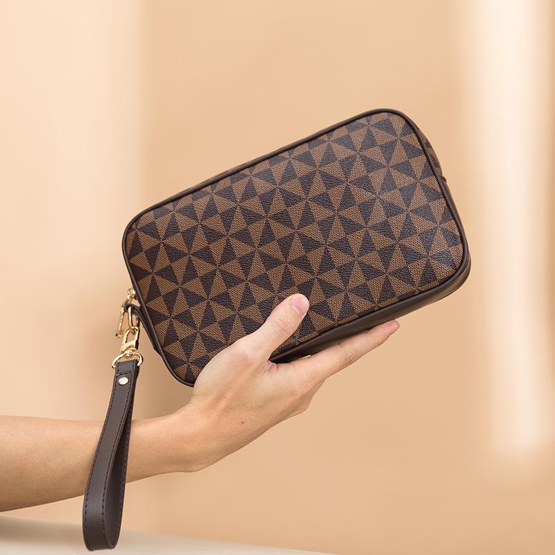 Fashion Printed Hand Catch Bag for Women Korean Version  New Easy To Wear Mobile Phone Coin Wallet Hand Wrapped Travel Toiletries Trend