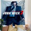 A suited man with a gun stands against a bullet-holed wall. Patterned tapestry for bedroom and living room home decor