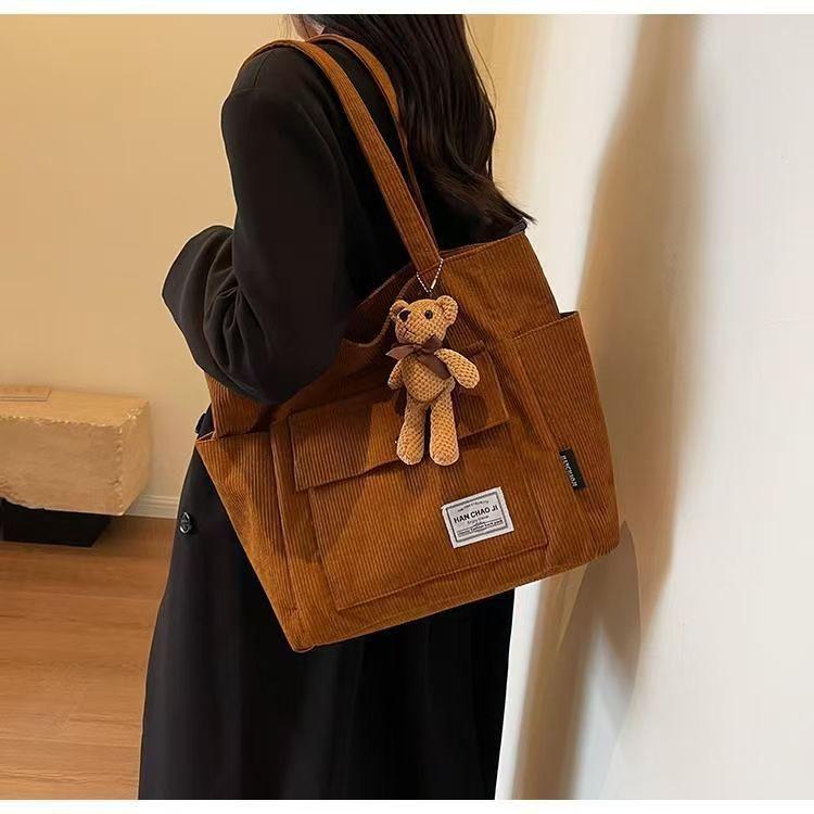 

Women’s Corduroy Tote Bag Large Capacity Shoulder Bag Casual Crossbody Handbag Multi Pocket Canvas Shopper Bag for School Travel Work Excludes Pendant