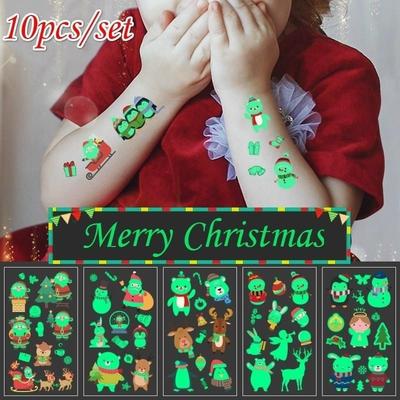 10 Stück/Set Neue Weihnachten Leuchtende Tattoo-Aufkleber Kinder Leuchtendes Spielzeug Schneemann Pinguin Gesichtssimulation Cartoon-Aufkleber