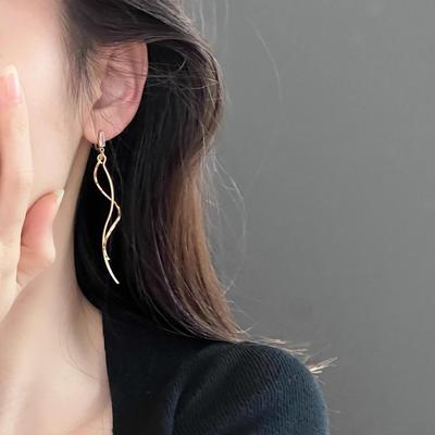Boucles d'oreilles à clip pompon long chinois pour femmes - Sans piercing, design petit visage carré, automne/hiver