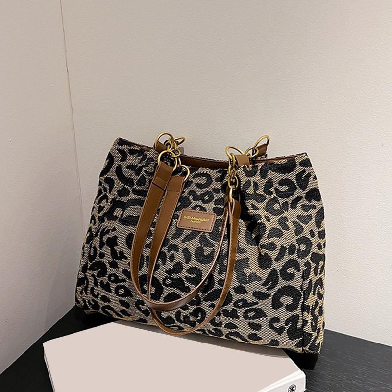 

Новая Мода Универсальная Сумка Через Плечо с Леопардовым Принтом Женская Сумка Высокая Текстура Большая Вместимость Сумка-Тоут для Шоппинга 35x12x28cm чёрный
