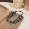 Buntes mehrschichtiges Perlenarmband - Elegantes und raffiniertes Handaccessoire für Damen mit verstellbarem Design