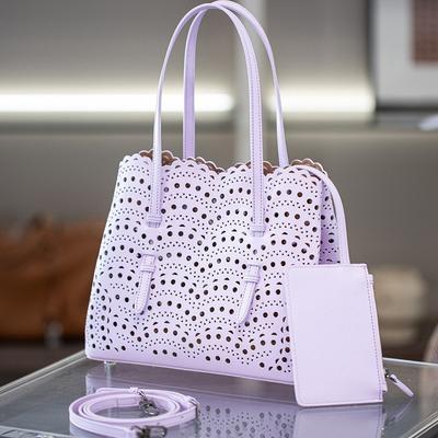 A Niche Wave Hollowed Out Carved Small Cowhide Vegetable Basket Women's Bag Single Shoulder Crossbody Fashionable Mother And Child Tote Women's Bag