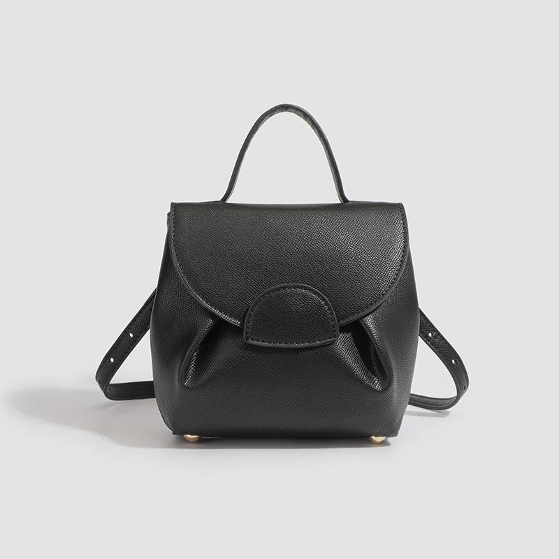 Ta damska torba niszowa, wysokiej klasy z uśmiechniętą buźką, jest modna i swobodna, i jest to torba do noszenia w ręku lub na ramię.