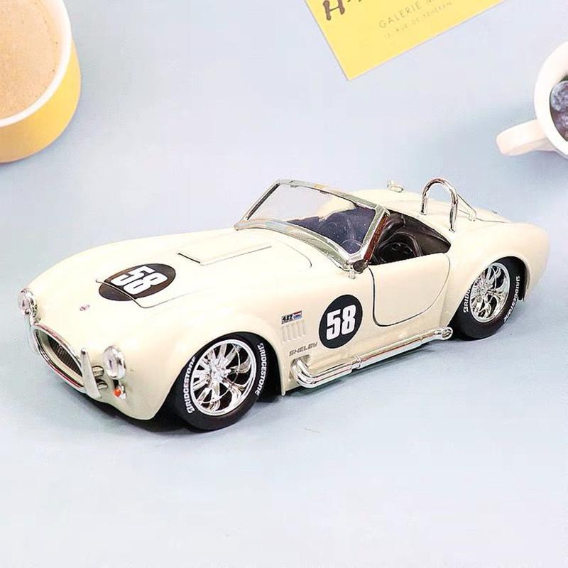 

1:24 Ford Shelby Cobra 427 S/C 1965 Іграшковий легкосплавний автомобіль, відлитий під тиском та іграшкові транспортні засоби Модель автомобіля Мініатюрна масштабна модель автомобіля для білий