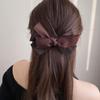 Elegant Korean Mesh Bow Banana Clip for Fine to Medium Hair, Ideal for High Ponytails.