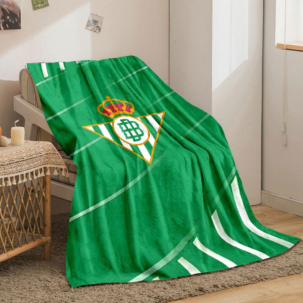 Diagonal green stripes with white accents and a central triangular logo. for all seasons blanket lunch break throw gift