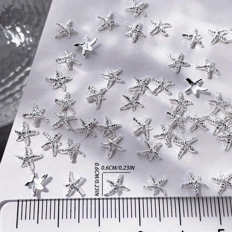 Goldene Seestern-Nagelanhänger Meeresstil Glitzernde Strasssteine Stern-Nagelkunst-Dekorationen Frühling Sommer 10 Stück 3D-Legierung DIY-Nagelsteine Geschenk für Mädchen