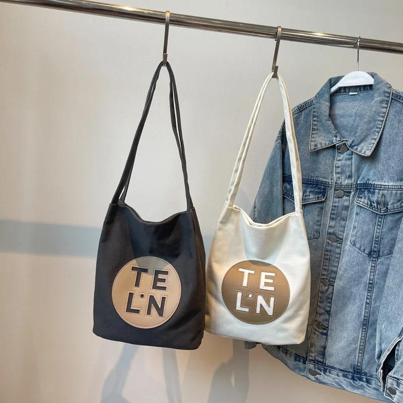 Cross-border New Letter Large-capacity Canvas Bag Women's Niche Fashion Shoulder Messenger Student Casual Tote Bag