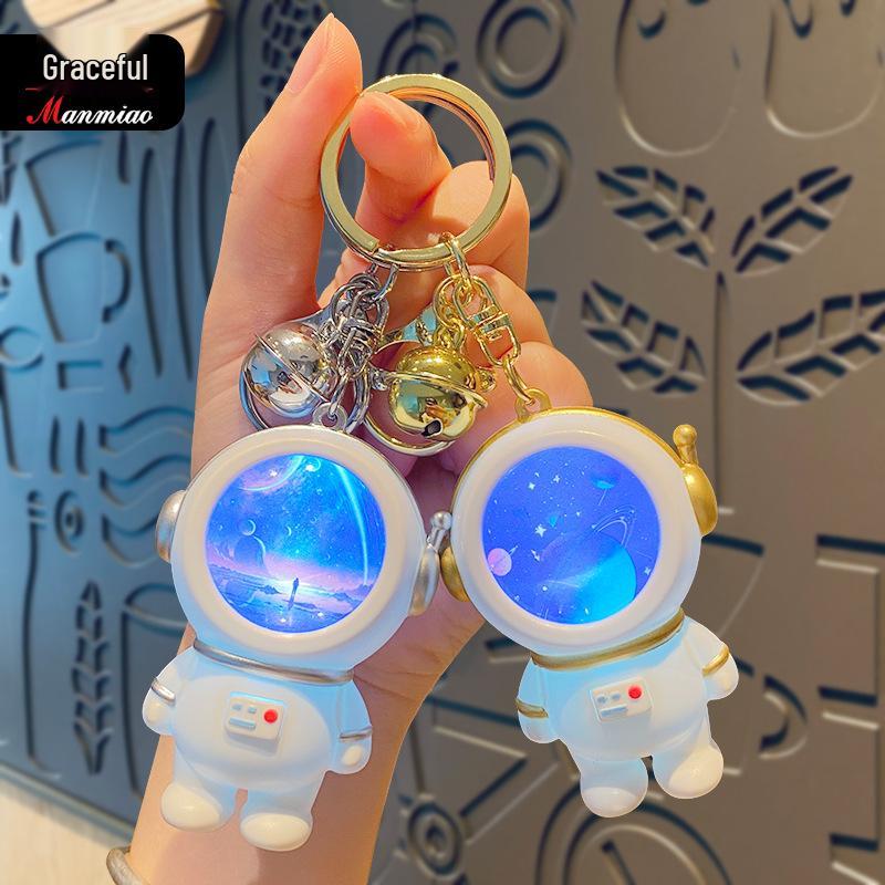 Creative Astronaut Starry Sky Keychain Pendant: Cartoon Doll Schoolbag Decoration, Perfect for Students or Couples.