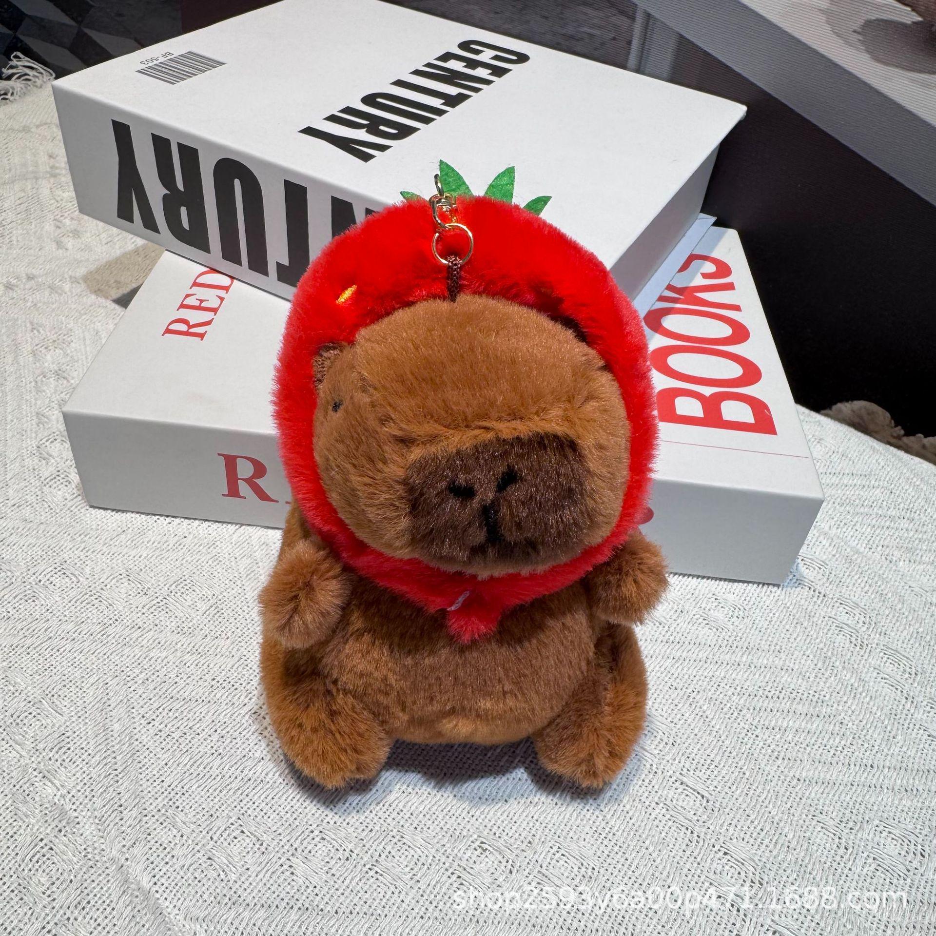 

Плюшевый кулон-капибара в армейском пальто и с брелоком-черепашкой Bare Model