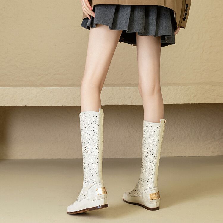 Leather breathable hollow boots women's 2025 new carved slope heel soft bottom hole cool boots women's inner height increase Martin boots