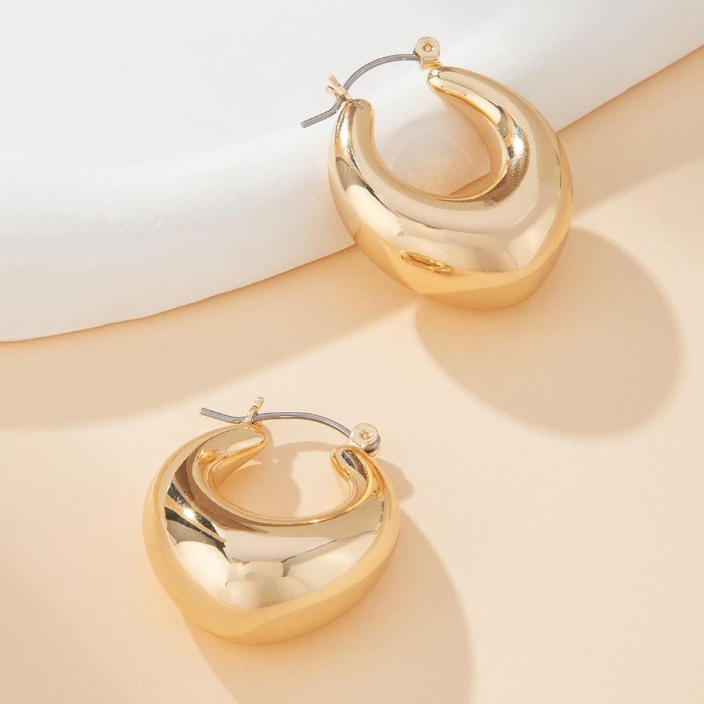 Glossy Gold-Plated Hollow Heart Earrings - Trendy and High-End Fashion Accessory