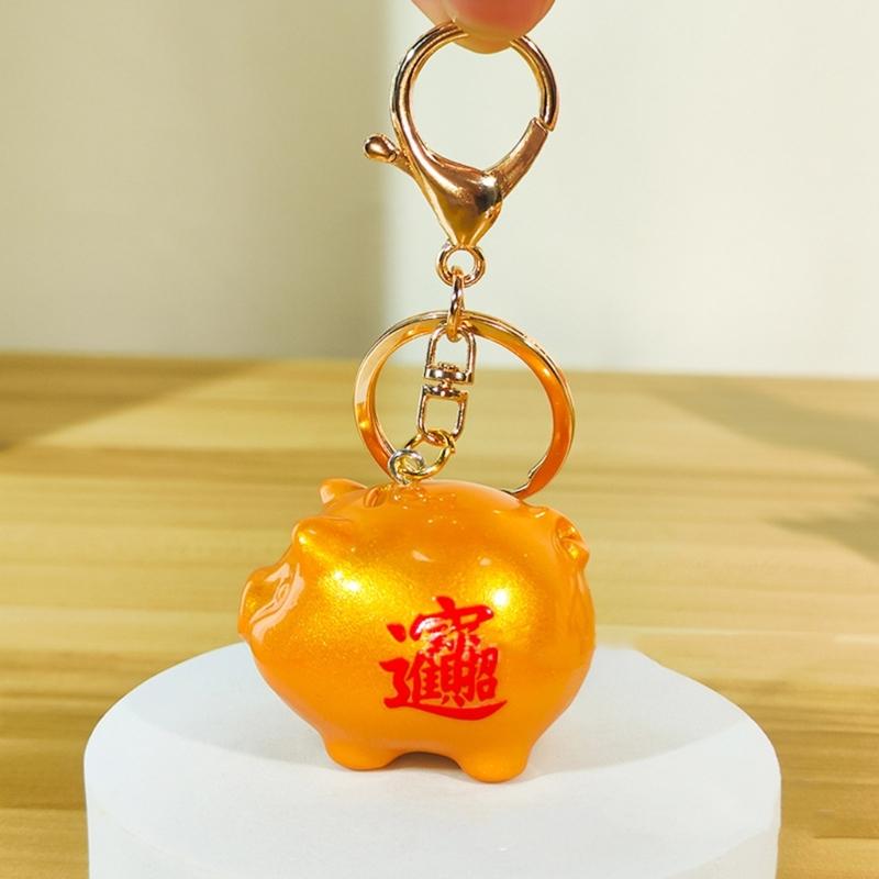 Prosperous Charm Pendant Keychain 2026 Golden Rubber Charm Keyring For Good Fortune Decoration And Daily Wear Use