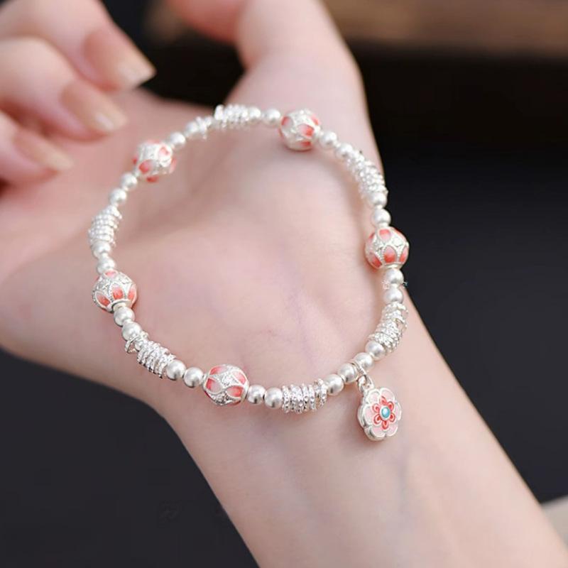 Enamel color Baoxiang flower bracelet, lucky character flower ball entanglement bracelet, light luxury high-end bracelet, fashionable and versatile