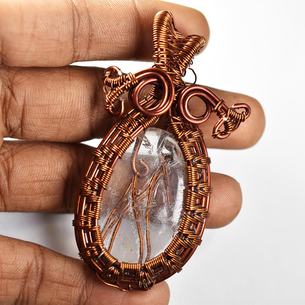 

98.5 Ct Certified Natural White Sapphire Copper Wire Wrapped Oval Cut Pendant 71.1 mm approx. білий