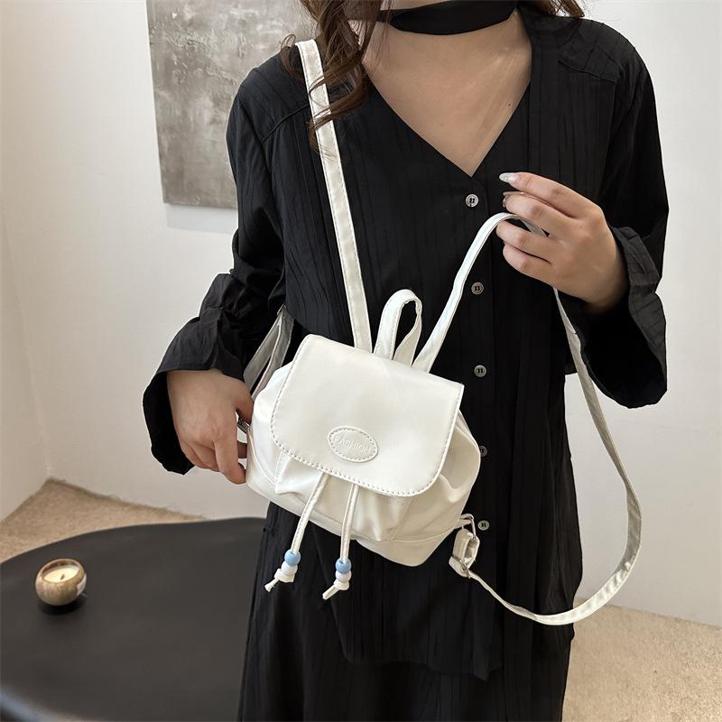 2025 new retro fashion solid color backpack women's bag winter leisure tide simple travel small backpack tide