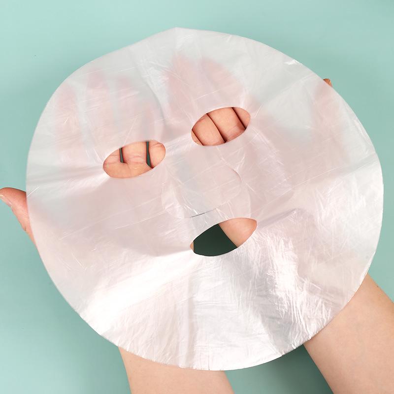 Aloe Vera Infused Disposable Plastic Mask Sheets - 100 Pieces for Moisturizing and Water-Locking in Beauty Salons