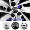 3D 4ks 56mm 60mm 65mm Samolepky na středové krytky kol automobilu Pro Insignia Astra J F Antara Meriva Zafira H G Corsa Vectra