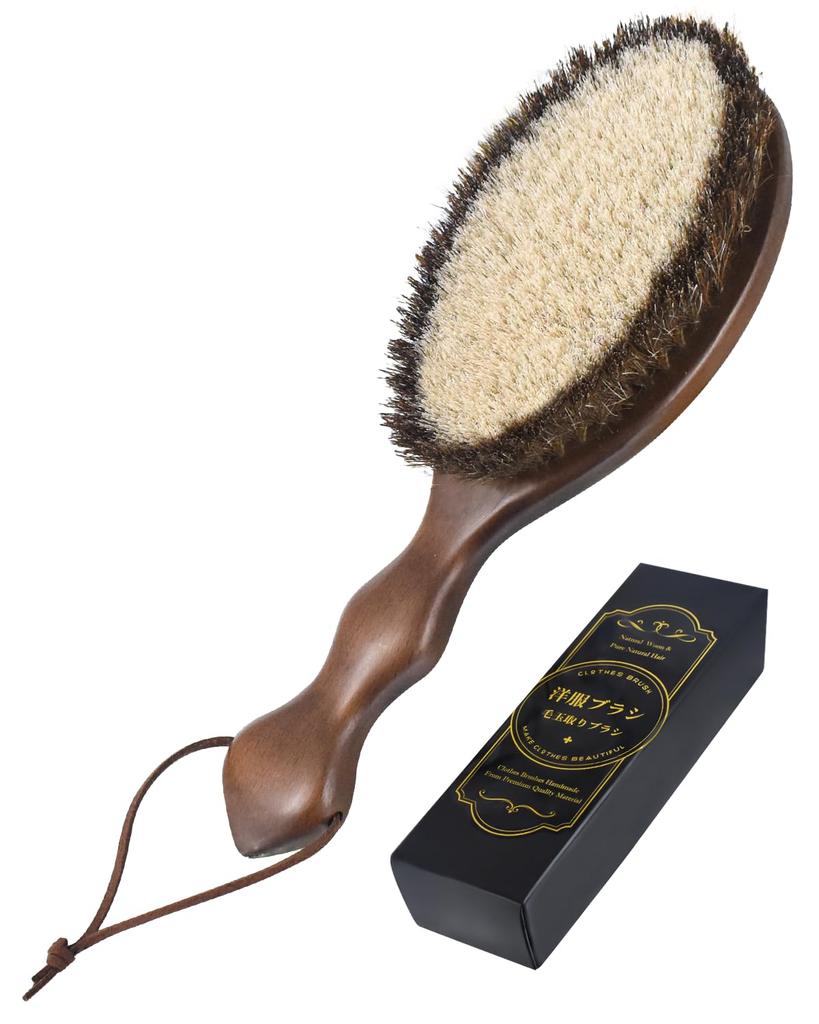 Restore the Original Luster of Your Clothes with This Snana Clothing a Royal Warrant Offers the Highest Quality Clothing Brush In a Black and White