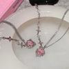 A Single-piece Pink, Understated Luxury Necklace for Women. Features a Minimalist Style with Diamond, Heart, and Star Patterns,