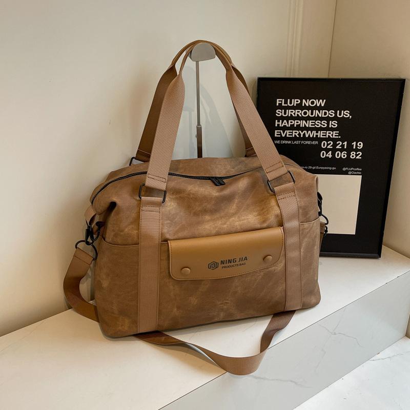 Large capacity portable travel bag, light fashion messenger sports fitness bag, trendy casual boarding storage bag