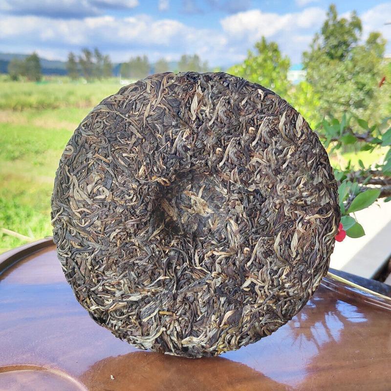 357g Ming Qian Ancient Tree Frühlingstee Pu'er Rohtee Siebensamen-Kuchentee