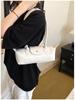 2026 French Light Luxury Cowhide Long Handle Dumpling Baguette Crossbody Bag