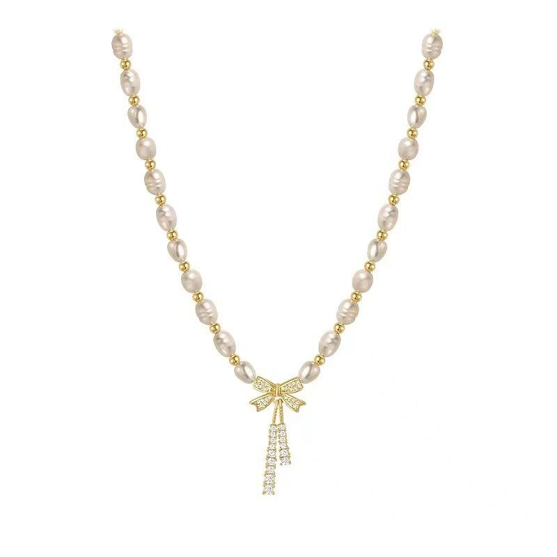

Freshwater pearl necklace slightly inlaid zircon bow French retro collarbone chain copper bead design sense necklace accessories women s accessories