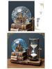 Retro Iron Tower Music Box with Luminous Crystal Ball Hourglass - Perfect for Desktop Ornament or Small Gift for Graduation, Qixi, or Valentine's Day.