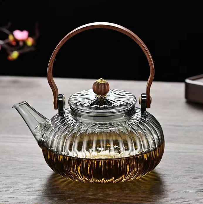 Pumpkin-Shaped High-Temperature Resistant Glass Teapot with Handle for Stove and Electric Ceramic Stove Heating.