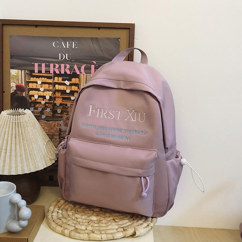 School bag Korean version ins style versatile junior high school student school bag solid color letter backpack high value simple lightweight backpack