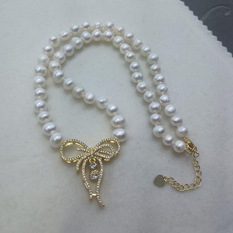 Gold Bow Freshwater Pearl Choker Necklace - Elegant & Luxurious Fashion Accessory for Women